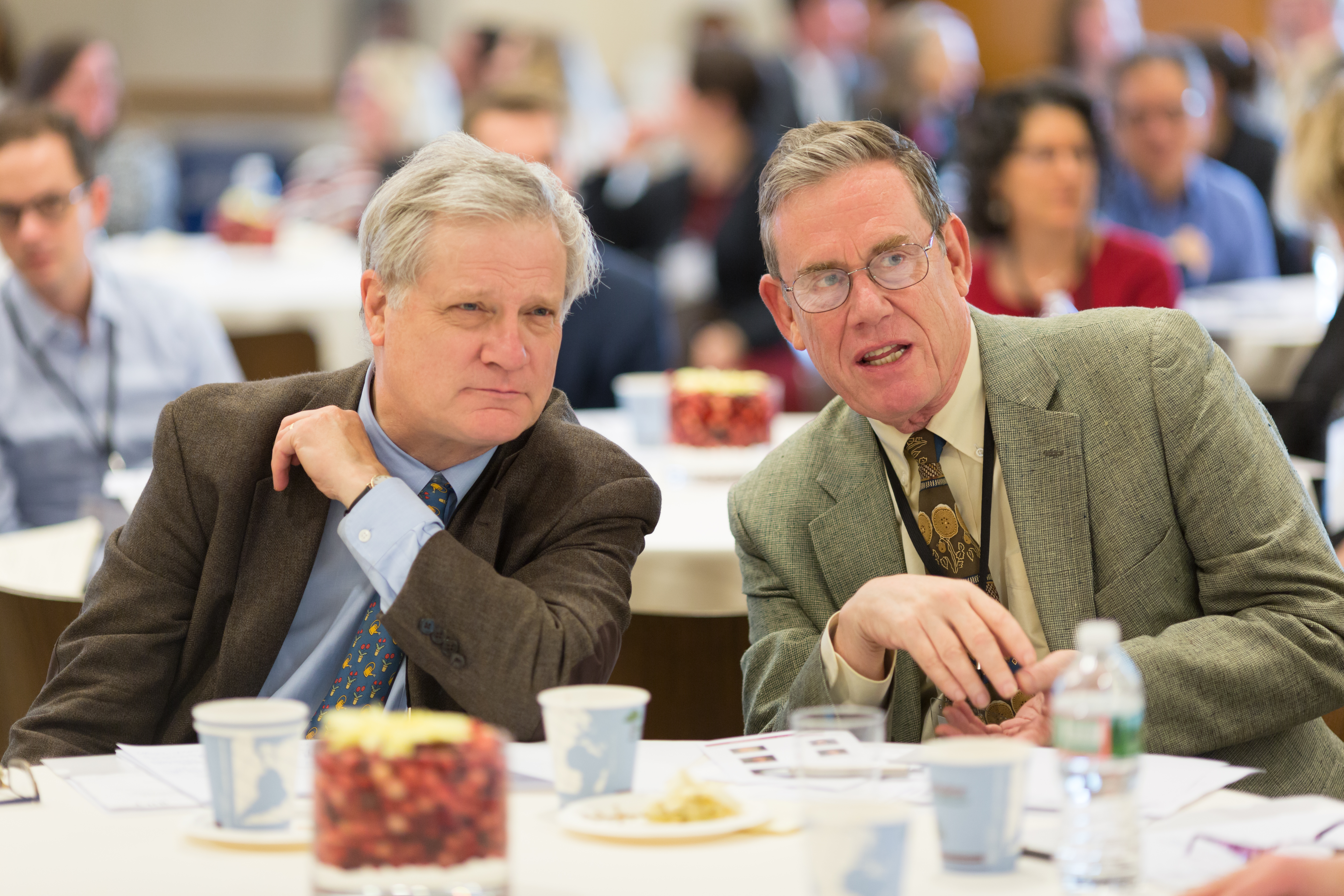 Professors Jim Engell and Peter Bol converse over breakfast.