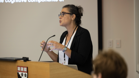 A woman speaking at a podium