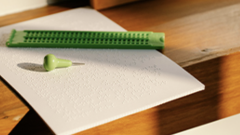 Braille embroidery on a pice of paper