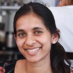 Leena Ambady smiling brightly