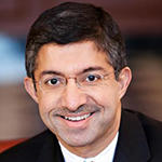 Bharat Anand smiling brightly