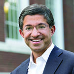 Bharat Anand smiling brightly