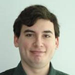 Joe Blitzstein's headshot on a light green background.