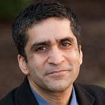 Rakesh Khurana smiling softly.
