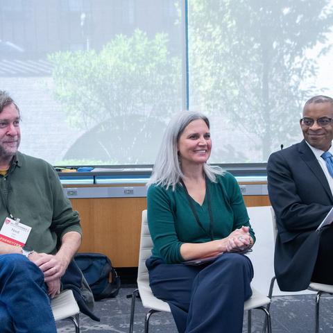 HILT 2025 Conference panel speakers smiling graciously at their audience.
