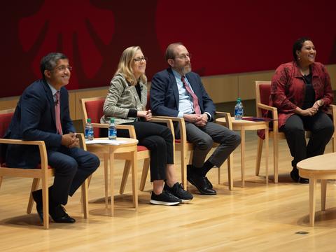 people sitting on stage