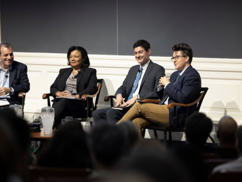 people sitting on stage