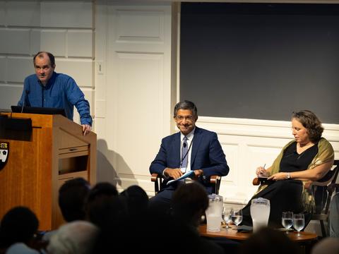 people sitting on stage