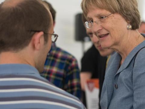 A woman wearing glasses