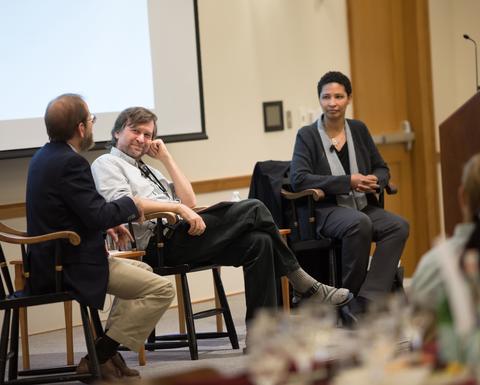 Three HILT 2016 Conference panelists on stage holding a discussion.
