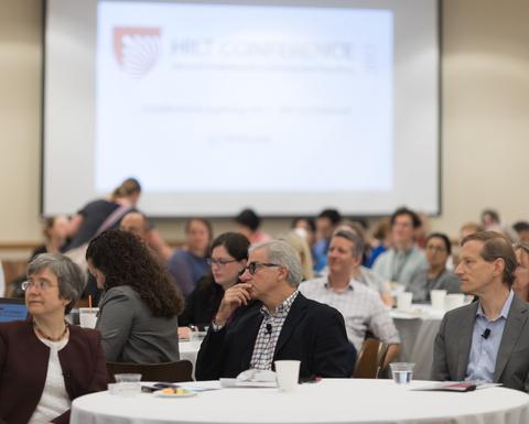 HILT 2017 Conference attendees closely watching a presentation.