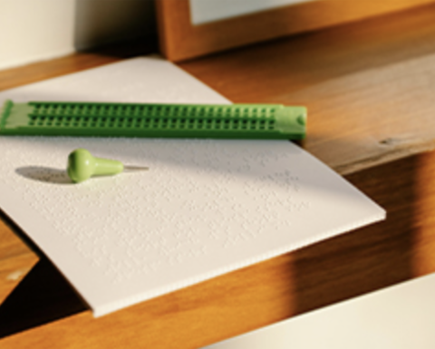 Braille embroidery on a pice of paper