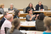 Attendees engage with speakers in breakout session