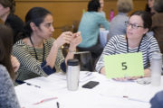 Attendees work in small groups during breakout session