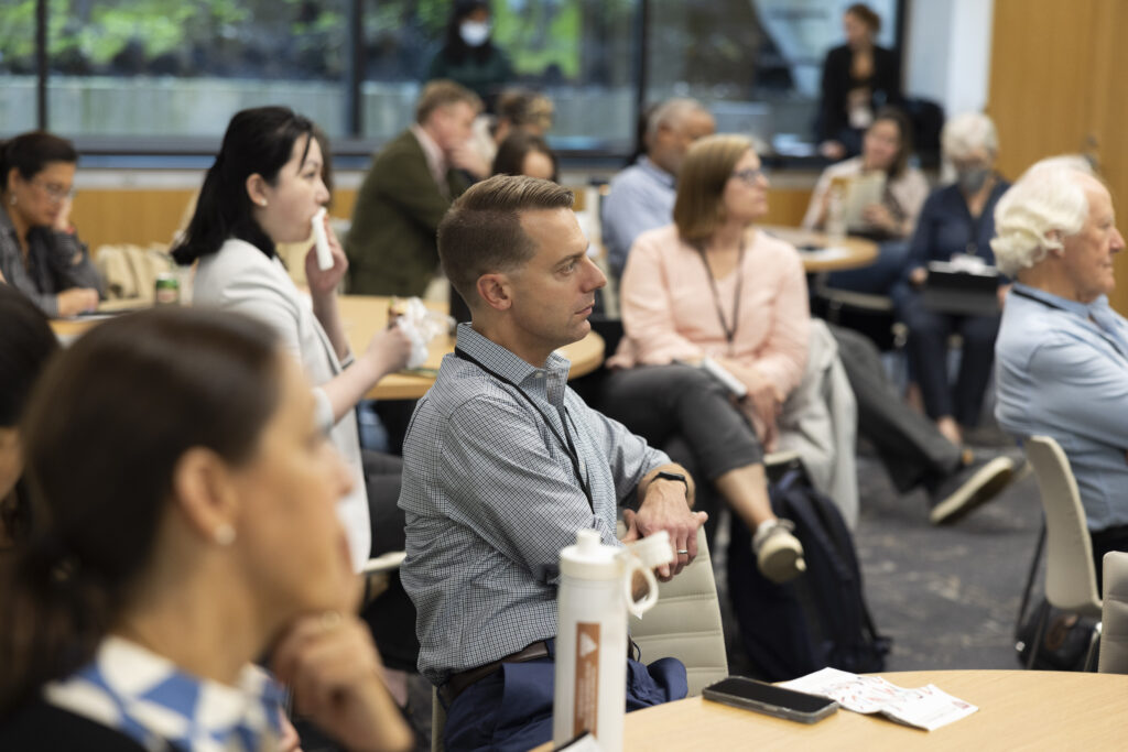 HILT Conference participants watching a presentation