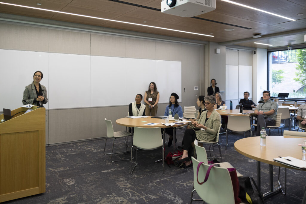 HILT Conference participants watching a presentation by Zoe Marks