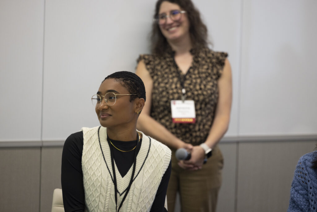 HILT Conference participant watching a presentation