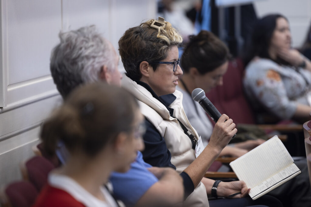 HILT Conference participant asking a question using a microphone