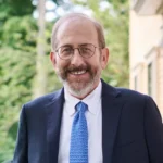 Headshot of Harvard President Alan Garber