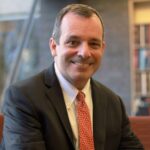 Headshot of Harvard University Provost John Manning